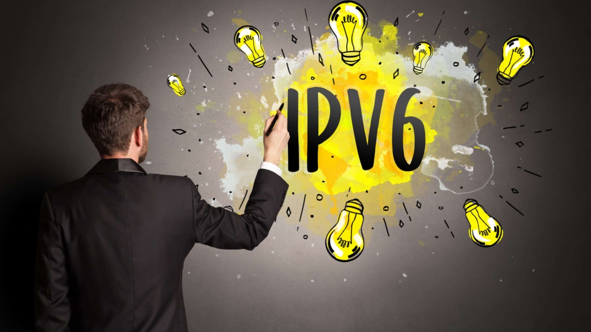 businessman drawing colorful light bulb with IPV6 abbreviation, new technology idea concept