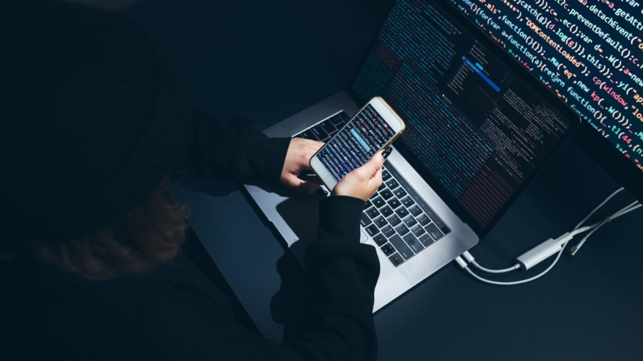 Cyber security threat. Young woman using computer and coding. Internet and network security. Stealing private information. Person using technology to steal password and private data. Cyber attack crime